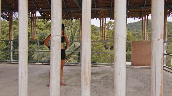 Woman Fighter Trains Her Punches Training Day in the Abandoned Hotel Strength Fit Body