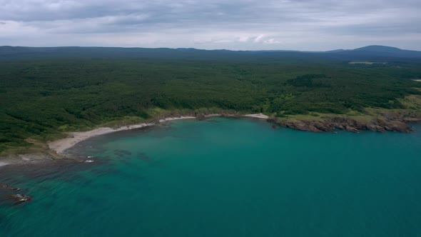 Drone flight above a picturesque rocky coastline