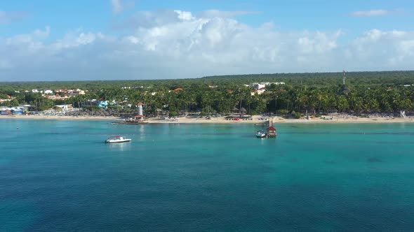 Dominicus Beach at Bayahibe with Caribbean Sea Sandy Seashore Lighthouse and Pier