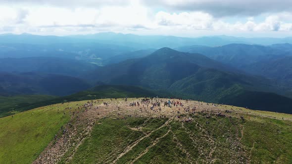 Tourists Climb to the Top of the Mountain Hoverla Aerial Panorama View