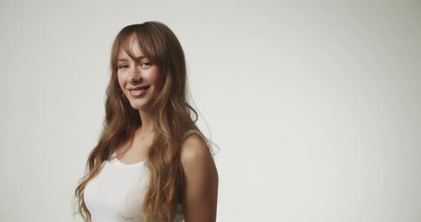 Beautiful Young Woman Wearing White Vest