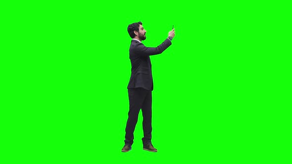 Businessman Recording with Phone