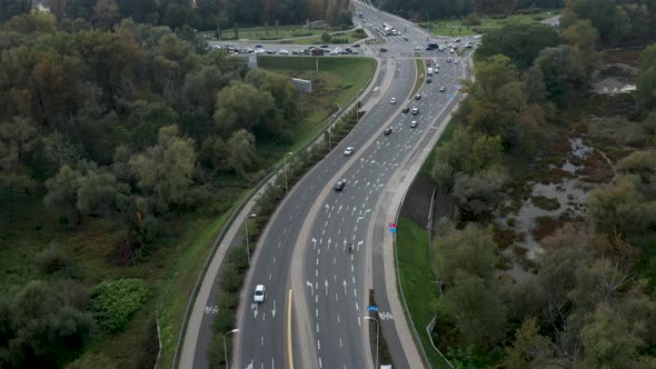 Aerial drone view of Warsaw skyline, Świętokrzyski Bridge and road junction in the foreground. Warsa