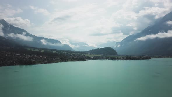 Breathtaking View From Above of a Swiss Lake Surrounded By Tall Mountains