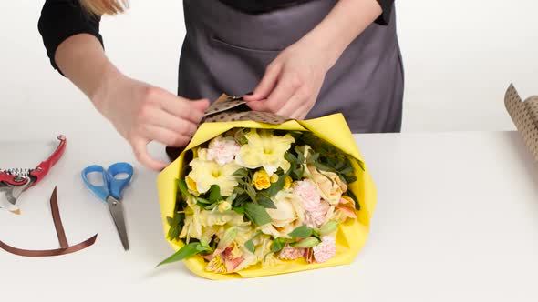 Florist in Flower Shop. Preparing of Bouquets. White. Close Up