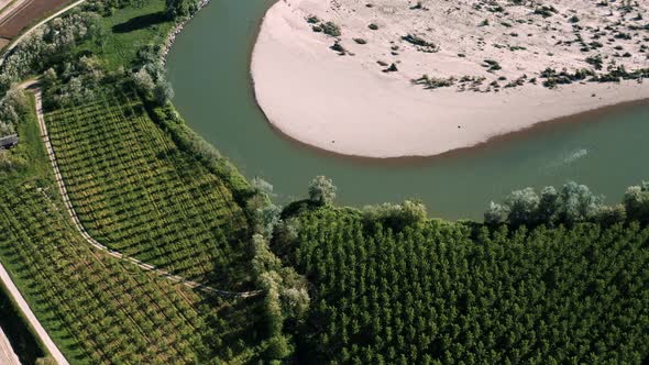 Aerial view of a big bend of the river Sesia in Langosco, Po Valley, Italy.