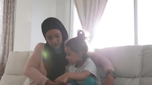 Mother and daughter at home