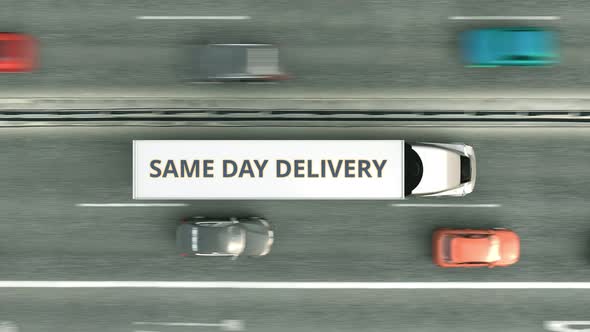Trucks with SAME DAY DELIVERY Text Driving Along the Highway