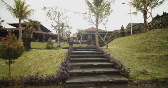 Point of View Shot of Walking Up the Stairs in an Ancient Black Stone Besakih Temple in Bali