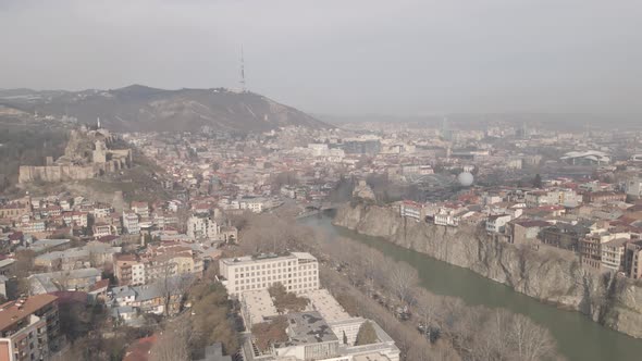 Tbilisi, Georgia - April 3 2021: Flying over Ortachala district in old Tbilisi.