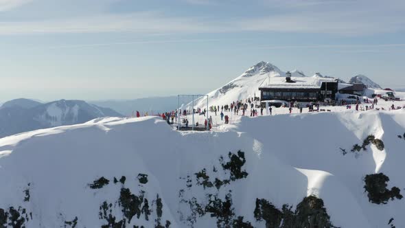 Active People Spending Time on Mountain Peak 2320 in Alpine Ski Resort