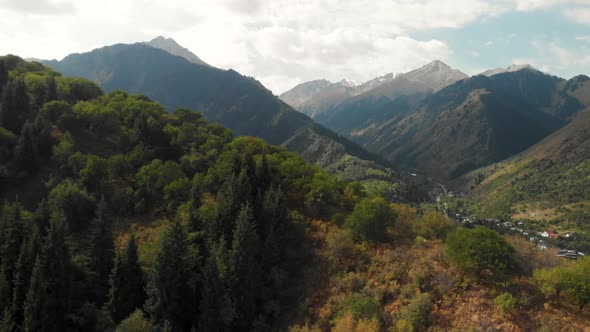 Aerial Drone Shot of Green Forest and Mountains in Kazakhstan