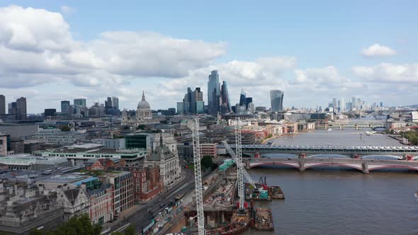 Forwards Fly Above Construction Site of Blackfriars Bridge Foreshore at Thames River Bank