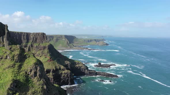 The Giants Causeway lies at the foot of the basalt cliffs along the sea coast on the north shores of