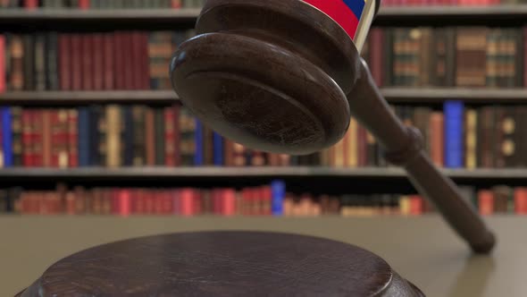 Flag of Venezuela on Falling Judges Gavel in Court