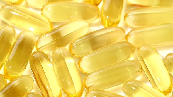 Closeup Medicine Yellow Transparent Pills Omega 3 Fish Oil Capsules Vitamin E