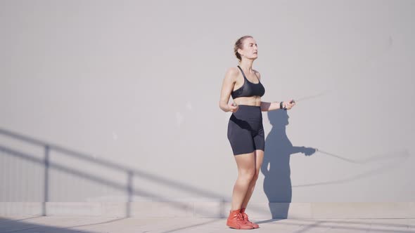 Cinematic action footage of a sport woman training