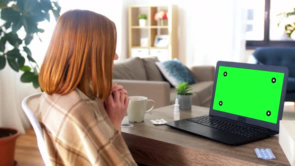 Sick Woman Having Video Call on Laptop at Home