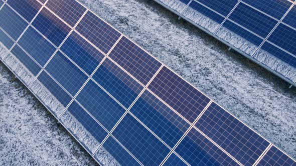 Close Up Drone View of Solar Panels Stand in a Row in the Fields Power Ecology Innovation Nature