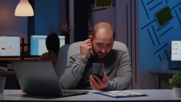 Entrepreneur Man Chatting with Company Teamwork on Phone Planning Management Meeting