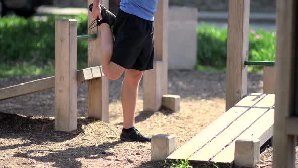 A man stretching before going on a run