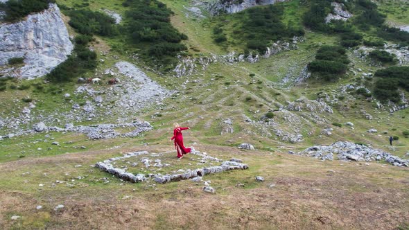 Woman in Red Dress in Durmitor Mountains