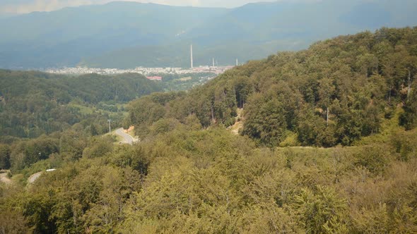 Aerial view of a forest and hills