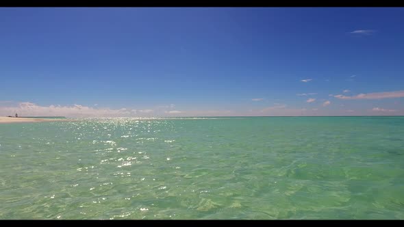 Aerial drone shot seascape of luxury lagoon beach holiday by shallow sea and clean sand background o