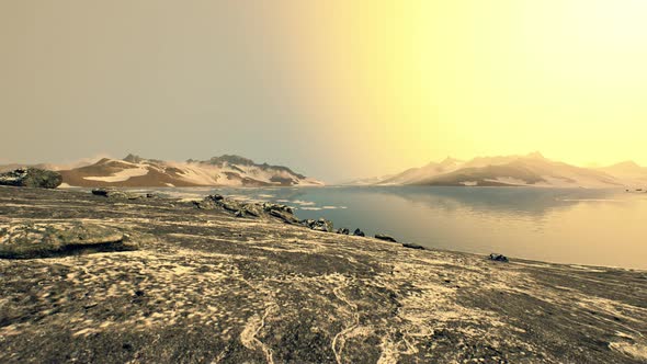 Coastline of Antarctica with Stones and Ice