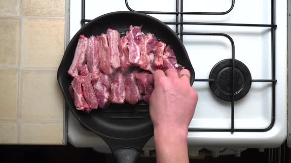 Real Home Cooking on a Frying Pan on a Regular Stove on the Kitchen