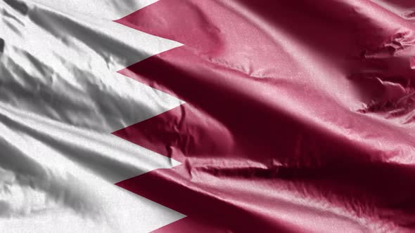 Bahrain textile flag waving on the wind. 10 seconds loop.