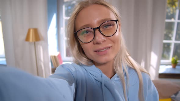 POV Shot of Smiling Young Woman in Glasses Talk on Video Call