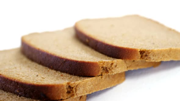 Sliced bread on white background