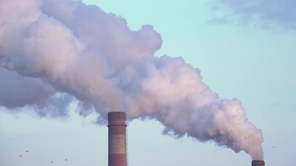 Polluting Factory at Sunset