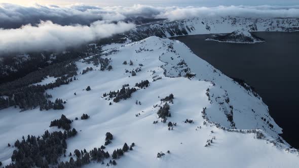 Aerial view of Crater Lake with Wizard Island with ice in winter, Oregon, USA