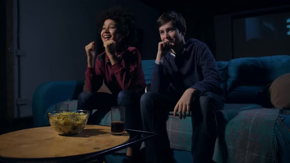 Active Football Fan Teens Watching Match on TV