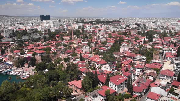 Flight over houses rooftops in Antalya, Turkey. 