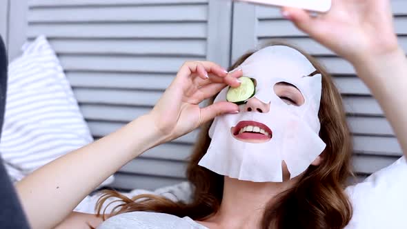 Happy Woman Doing Clean Mask And Selfie