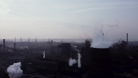 Aerial view. Pipes Throwing Smoke in the air. Large Plant. Air Pollution Concept. global warming