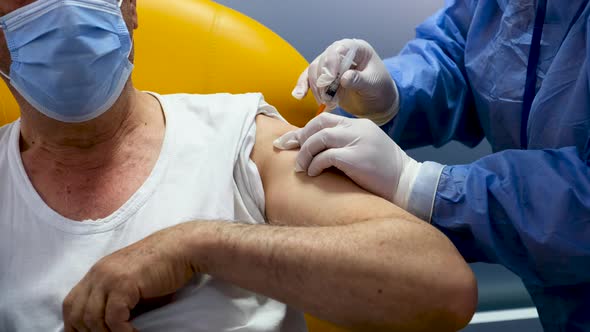 Man Getting The COVID-19 Vaccine