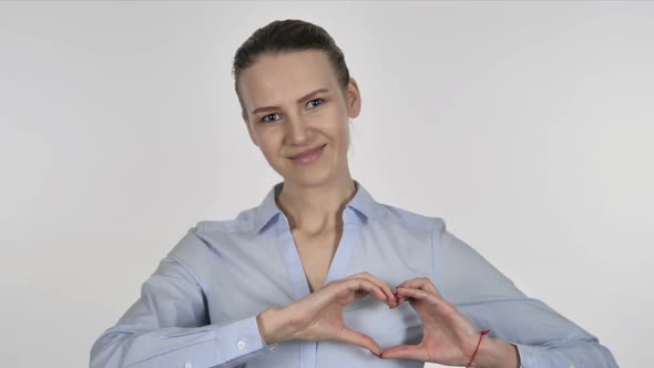 Handmade Heart By Young Businesswoman on White Background