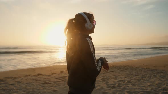 Listening To Music On The Beach