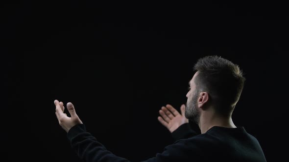 Praying Man With Raised Hands Up Looking at Holy Spirit of Savior, Resurrection