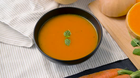 Close Up of Vegetable Pumpkin Cream Soup in Bowl 