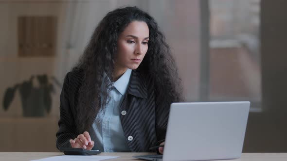 Concentrated Female Arab Businesswoman Multitasking Worker Accountant Calculate Costs Credit Balance