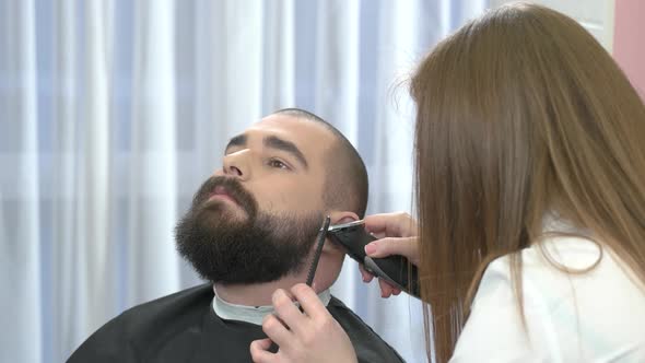 Female Barber Grooming Beard