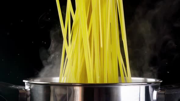 Pasta Falling Into Pot Slow Motion