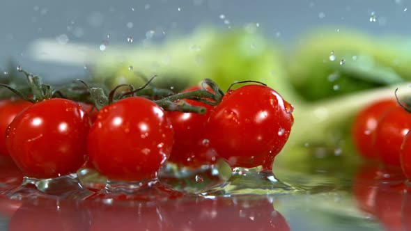 Tomatoes Falling to Water in Super Slow Motion Shot with High Speed Cinema Camera in   1000Fps