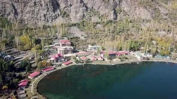 Aerial View Over Shangrila Resort Skardu Beside Lower Kachura Lake. Dolly Forward, Pedestal Down