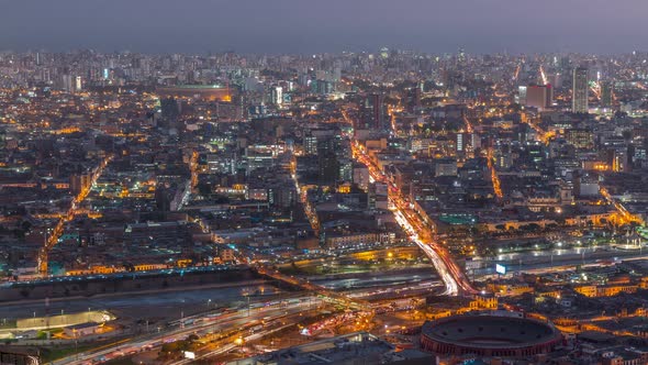 Aerial View of Lima Skyline Day to Night Timelapse From San Cristobal Hill